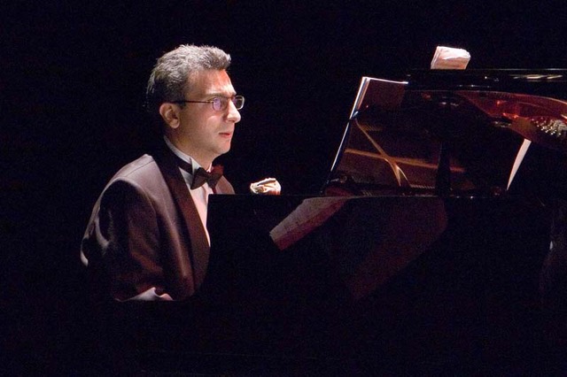 The artist at the piano